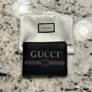 Gucci GG Print Leather Bi-Fold Wallet